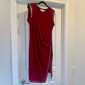 Emma and Michele. Wrap style, asymmetrical dress. Women’s size L.